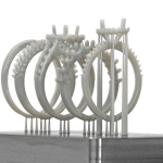 The Micro cDLM high-speed continuous 3D printer can build a tray of custom engagement ring patterns in under 15 minutes.