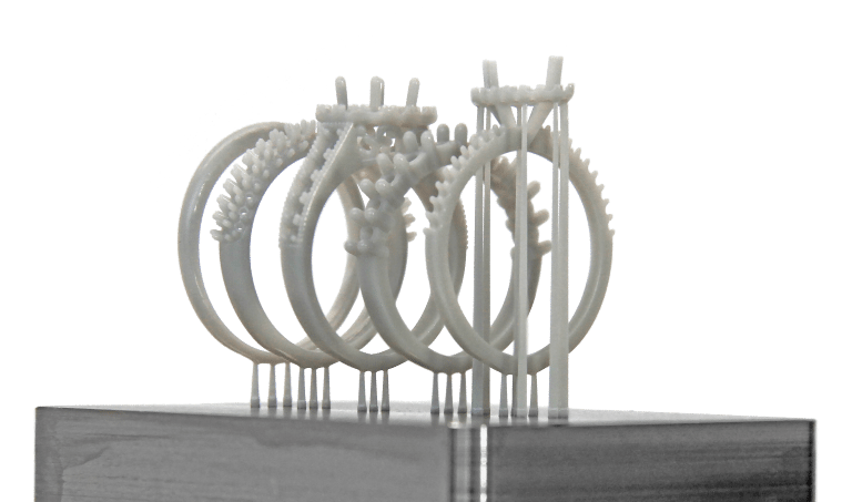 The Micro cDLM high-speed continuous 3D printer can build a tray of custom engagement ring patterns in under 15 minutes.